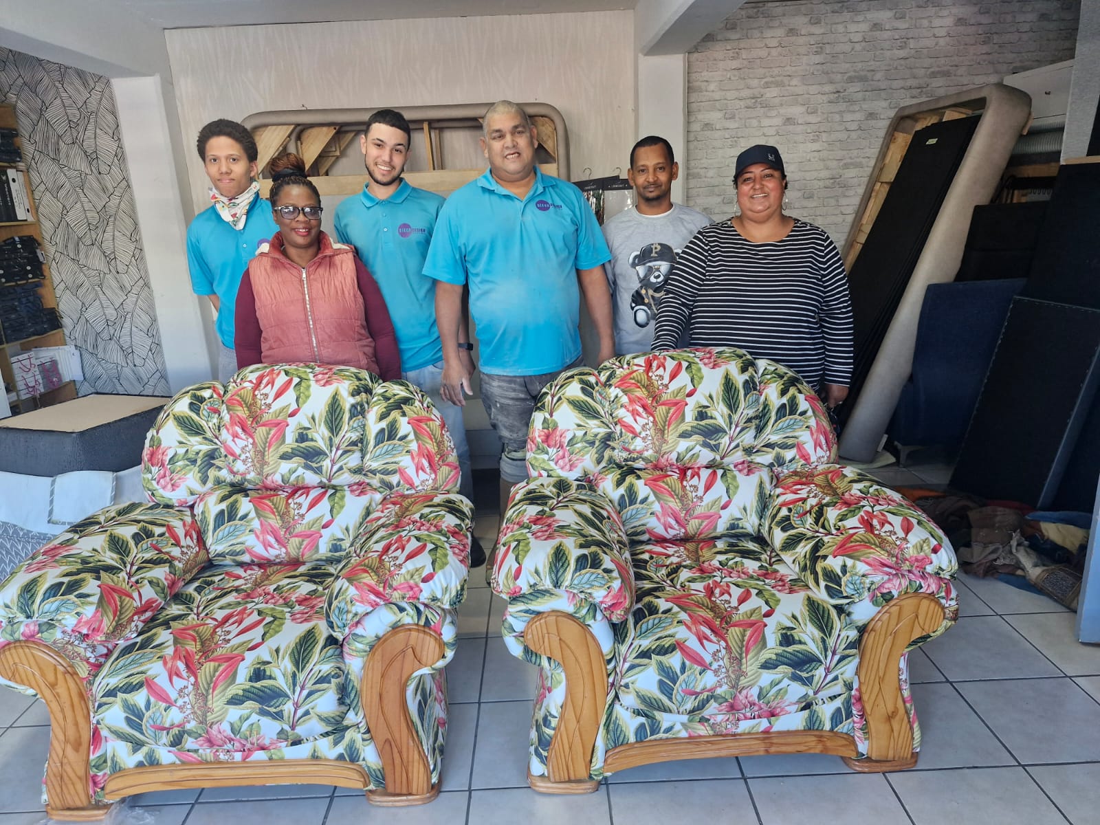 Décor Design team in the workshop with refurbished armchairs
